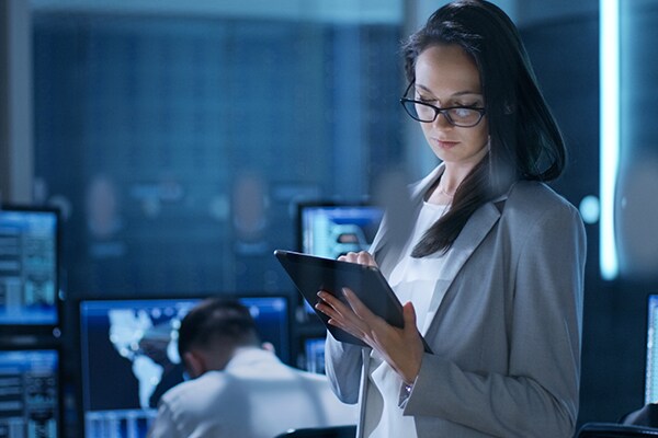 woman using tab in office